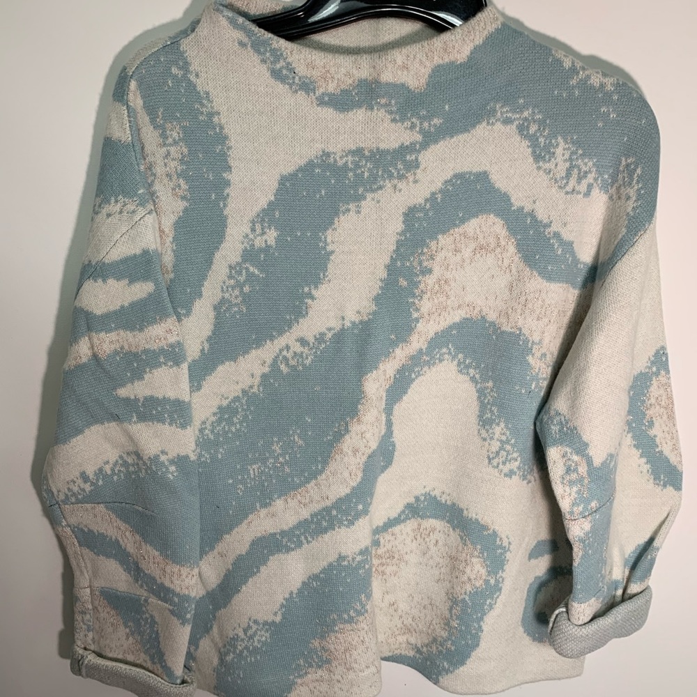 Blue and white and gold sweater